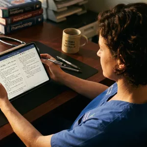 Person reading article on handheld device