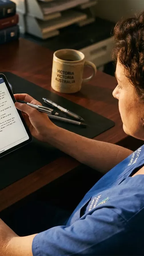 Person reading article on handheld device